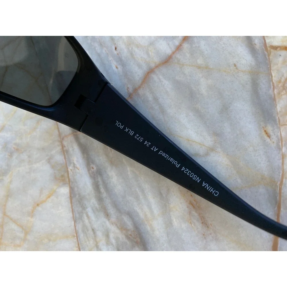 Foster Grant NS0324 Polarized Wrap Sunglasses Matte Black AT 24 572 BLK POL